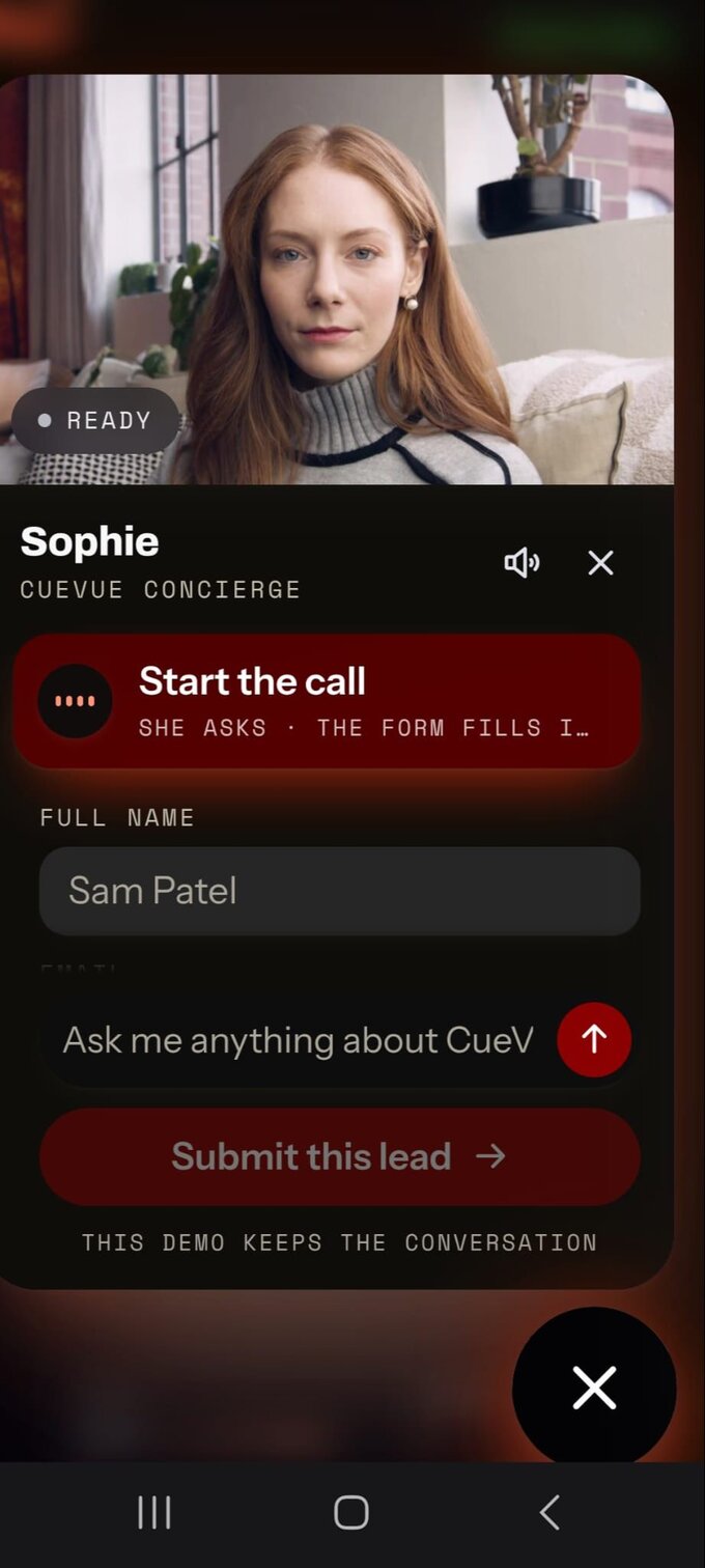 The AI receptionist running on a mobile phone, holding a conversation with a visitor and capturing their details